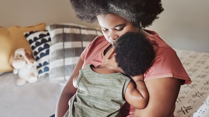 Baby and mum having a cuddle